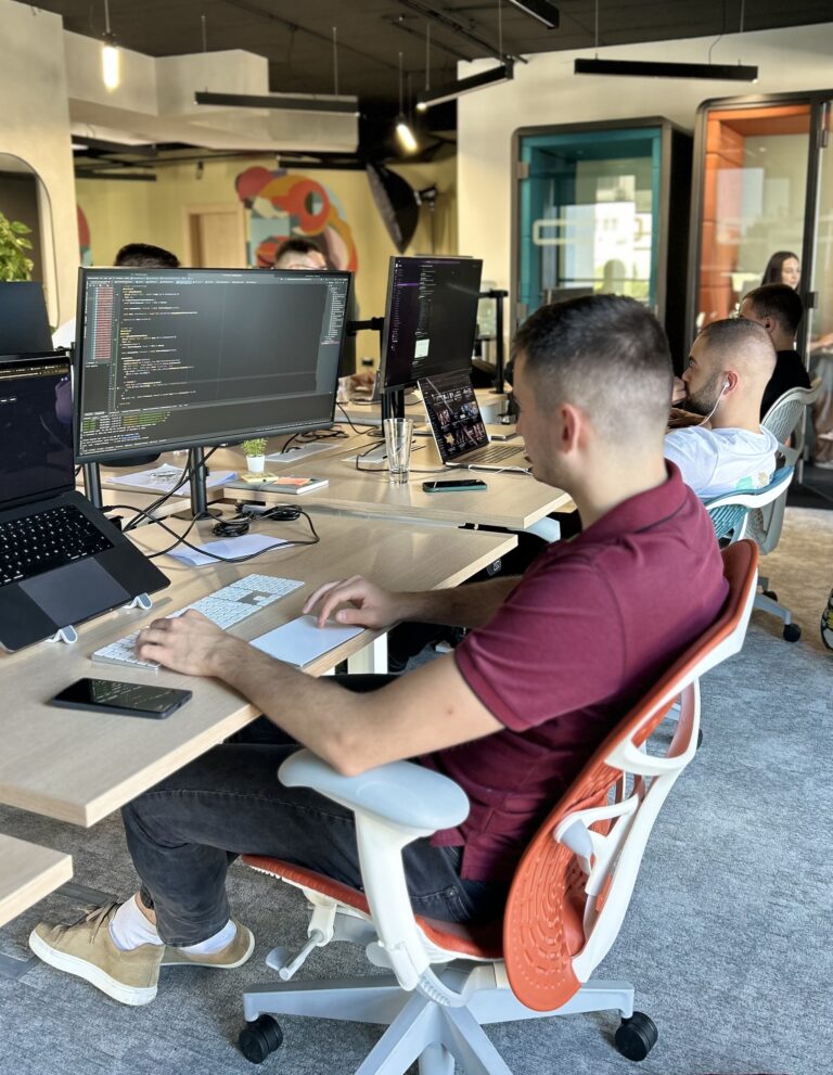nQode software developers in office